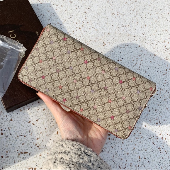 Gucci Handbags - NWT Authentic Gucci Limited Star ⭐️ prints Wallet